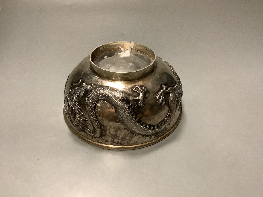 A late 19th/early 20th century Chinese Export bowl by Wang Hing, with engraved inscription and embossed with dragons, on circular foot, diameter 16.2cm, 11.5oz.